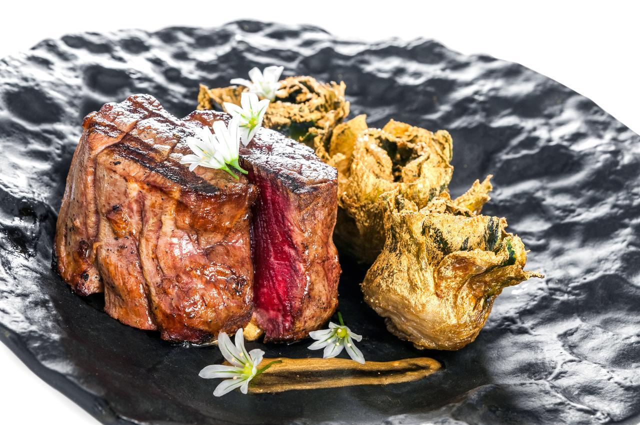 Eurostars Grand Marina Hotel Gl Barcelona Exterior photo A steak with a side of gyoza